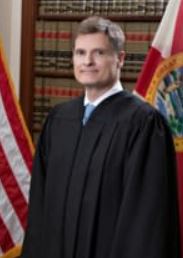 Picture of Justice Carlos G. Muniz